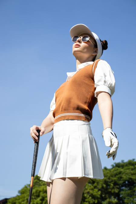 Woman in golf attire